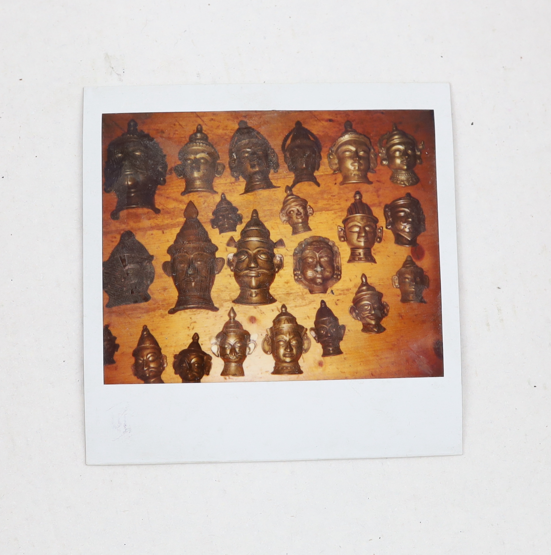 A group of nineteen bronze or brass Shiva masks, Southern India, 16th-19th century, 6.2 - 19.5cm high